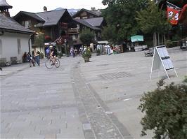 Riding through the bustling town of Gstaad